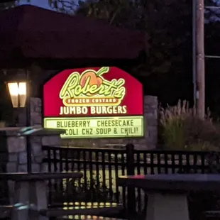 Look for the bright sign on the dark road
