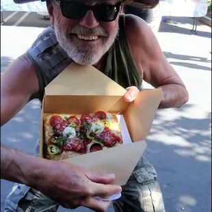 I'm a happy guy as Robert snapped my photo, as I get ready to enjoy my slice of "PBJ" pizza, at Mahany Park Farmers Market.