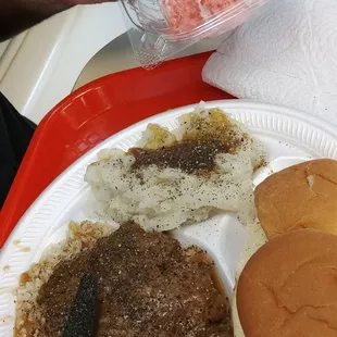 Salisbury steak with rice and mashed potatoes. Sweet tea and strawberry cake.