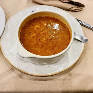 a bowl of soup on a plate