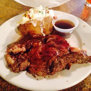 12oz. Prime rib and a fully loaded bake potato.