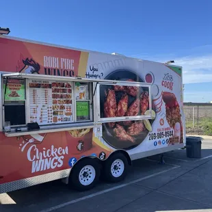 a food truck parked in a parking lot