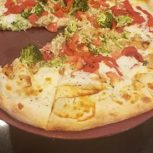 White pizza with broccoli, tomato garlic- we added roasted red peppers and chicken.   Plenty to take home.  Great deal!