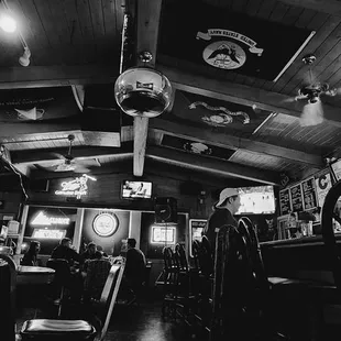 a black and white photo of a restaurant