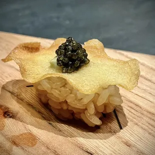 Homemade potato chip with caviar