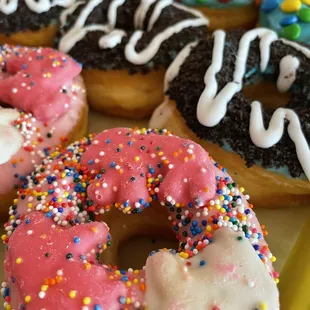 a variety of frosted donuts