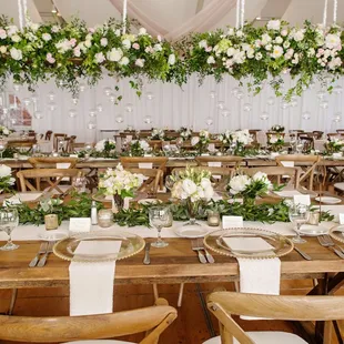 Hanging floral structure over bridal table