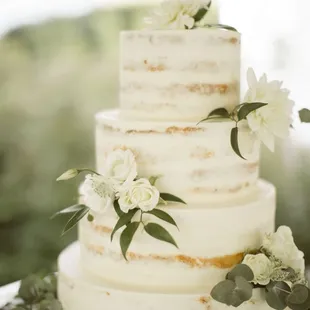 Simple floral accenting for naked wedding cake