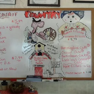This is Robin's specials order board with her wonderful desserts.  We tried the pork n beans cake and the hummingbird cake.