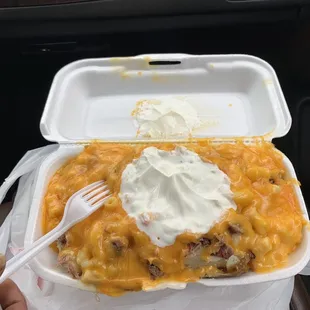 Loaded potato with no chives and added Mac &amp; cheese ‍