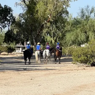 Trail riding class leaving for a trail ride