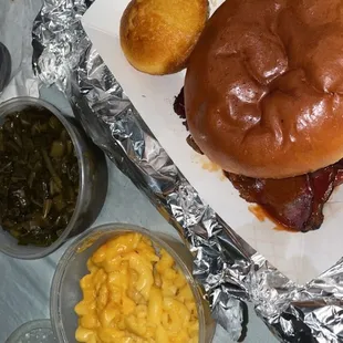 BBQ Beef Brisket Sandwich, Macaroni and Cheese, Collard Greens, cornbread muffin