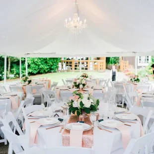 The tent draping by Prop Gallery and the chandelier provided by the venue created the not-rustic feel.  Photo by Kirsten Marie Photography.