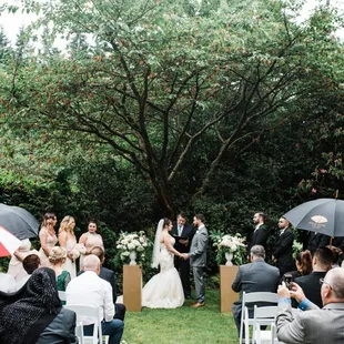 A beautiful, rainy, simple ceremony site. Photo by Kirsten Marie Photography