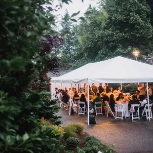 The rain kind of made it charming and more intimate :) Photo by Kirsten Marie Photography