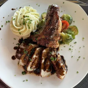 Delicious and tender thick cut pork chop with Balsamic reduction.