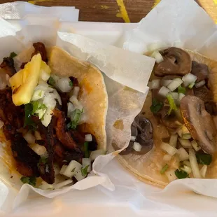 Soy pastor taco (left) and mushroom taco (right); both vegan