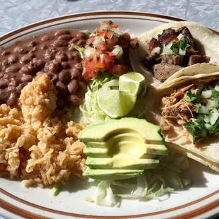 2 taco plate (Pollo and Carnitas) with rice, beans and avocado - delicious