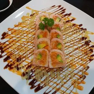 Beautiful presentation and delicious sushi wrapped in tofu.