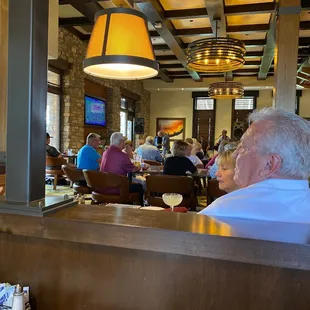 diners sitting at the bar