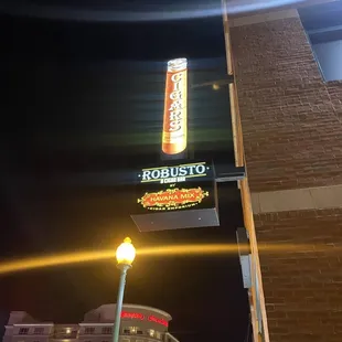a neon sign for a restaurant