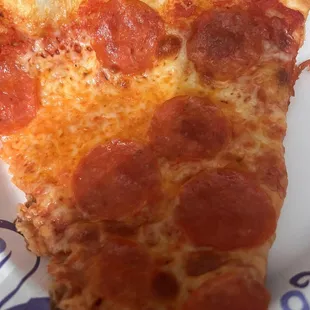 Huge Pepperoni Pizza slice $3.50