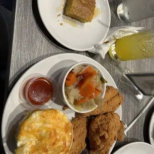 Catfish with mac and cheese and cabbage. Honey butter biscuit on the side