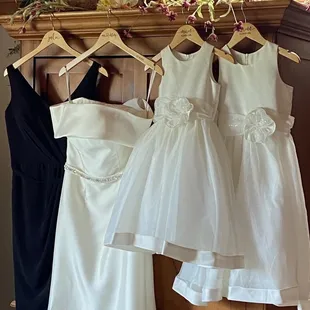 Gowns in the bridal getting ready room - log home.