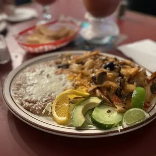 Seafood combination plate with rice and beans