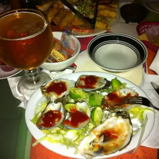 Raw oysters and Modelo, Mmm...'Mmm good!