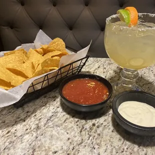 Margarita, chips, house dip, and salsa