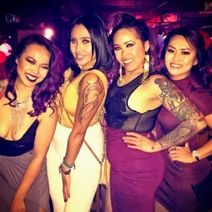 a group of women posing for a picture