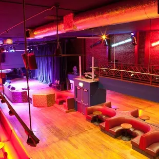 a dance floor with red lighting