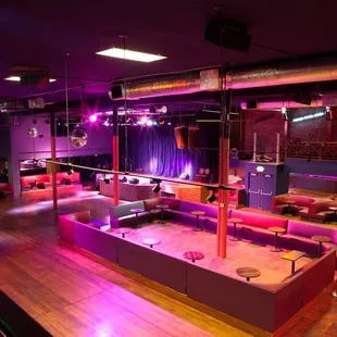 a large room with couches and tables