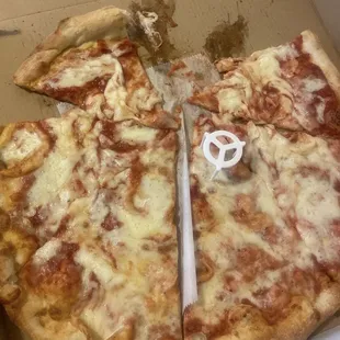 A sloppy pizza pie that wasn't cut properly!