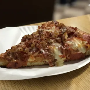 Best pizza! Must have. This is the pepperoni and bacon, which is my favorite out of all of them. I ate this 5 times in a matter of 2 days.