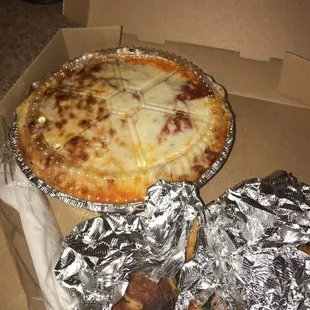 Eggplant Parmigiana Spaghetti ! And I got extra garlic knots! . Love that it was delivered in the pizza box.