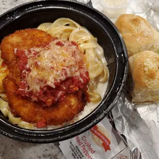 Delivery: Chicken parm with fettuccine alfredo and mini parmesan rolls