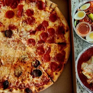 Large pepperoni and sausage. Lasagna. Rocco's salad.