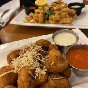 Fried mushrooms and calamari. Light &amp; crispy breading, great marinara.