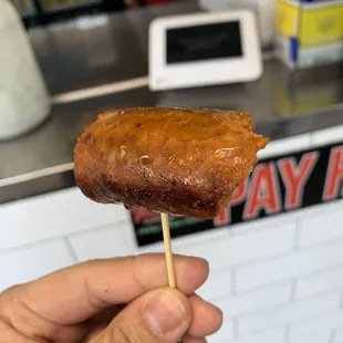 Complimentary spicy sausage sample