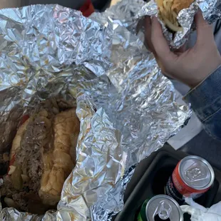 Half Philly Cheesesteak and Half Sausage Half and Half Sandwich