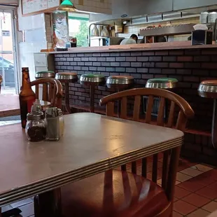 a table and chairs in a restaurant