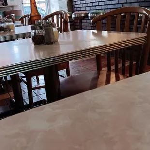 a table and chairs in a restaurant