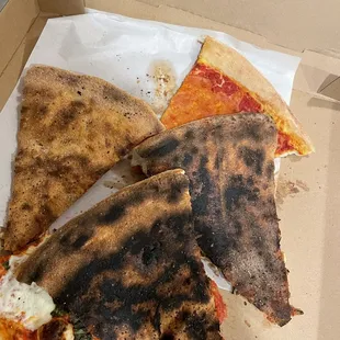 The pizza on the far left is the cheese pizza