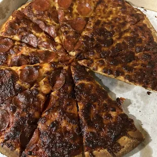 Burnt missing half pepperoni