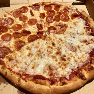 a pepperoni pizza in a box