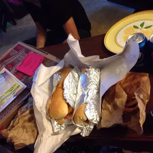 Two bags of fries, two subs, 2 cans of Pepsi, 1 16" cheese pizza