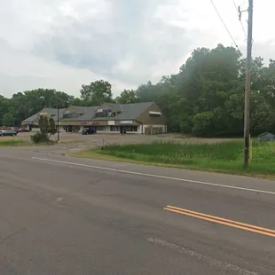 a view of the road from the front of the restaurant