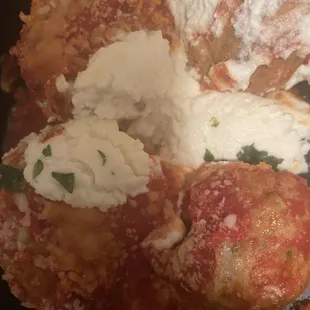 Handmade Meatballs with dallops of ricotta/mozarella